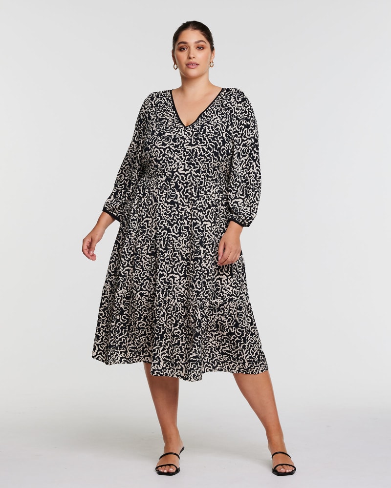 Front of a model wearing a size 22W SPARROW DRESS in Black/Cream by Estelle. | dia_product_style_image_id:302278